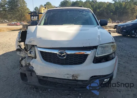 2010 Mazda Tribute I z USA, uszkodzony, nr VIN 4F2CY0C72AKM10013